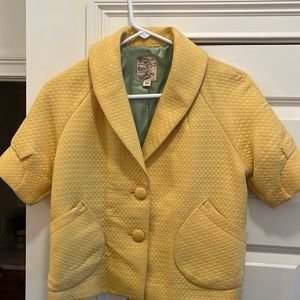 Beautiful yellow jacket with gorgeous soft green contrasting lining